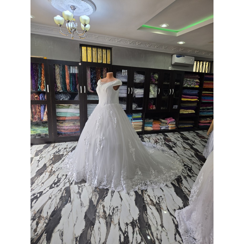 Queen's Apparel Abeokuta — Bridal Gowns Bridesmaid Dresses Alterations