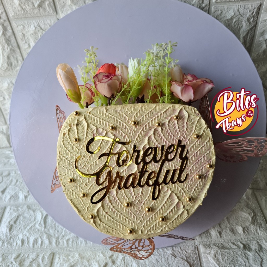 Bites by Tkays Kuje: Custom Wedding Cakes, Pastries and Small Chops